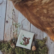 Embroidery file squirrel with snowdrops