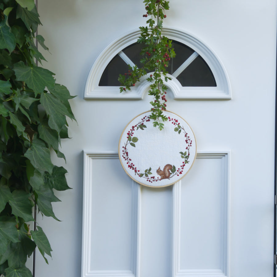 Embroidery file: Squirrel in a large berry wreath