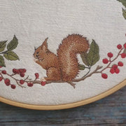 Embroidery file: Squirrel in a large berry wreath