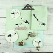 Embroidery file: Storks in a wreath